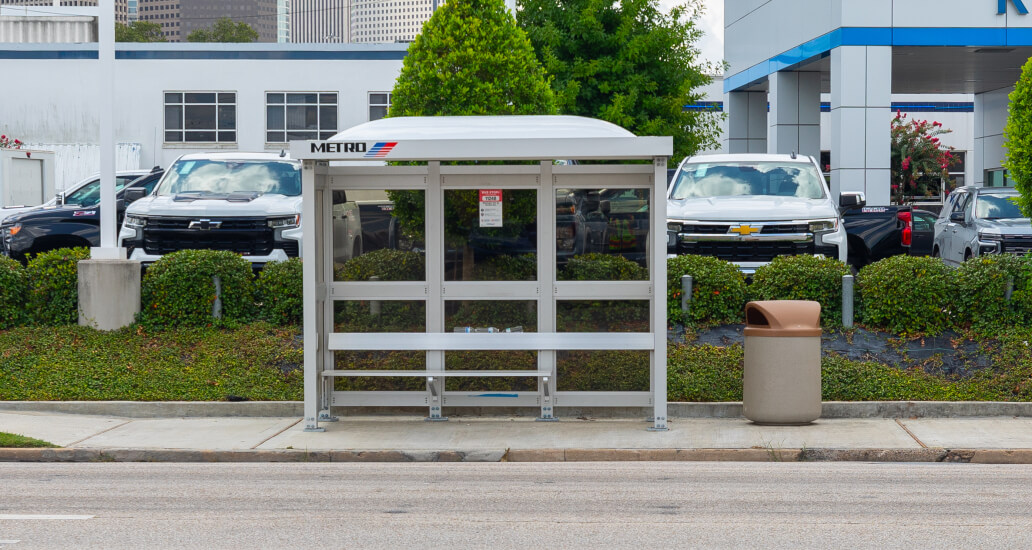 A new BOOST bus shelter and trash receptacle installed along Washington Avenue near Houston Avenue.