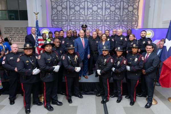 Santiago Osorio (far right) attends MPD Chief Ban Tien's Swear-In Ceremony.